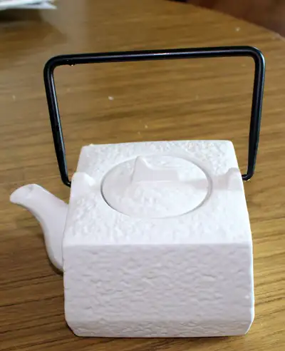 White porcelain square teapot with iron handle, View more