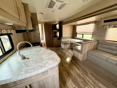 The Coachmen Catalina CAT281DDS is a family-friendly travel trailer featuring double-over-double bun...