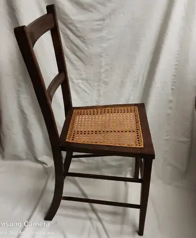 Antique solid fruit wood chair, ebony marquetry & cane seat, View more