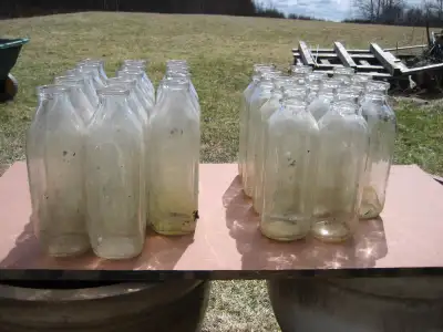 25 vintage glass milk bottles, View more