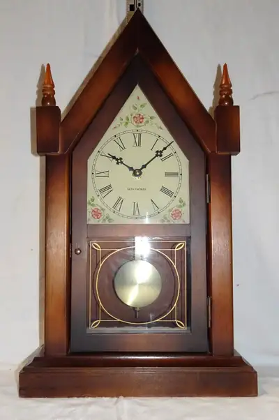This stunning ‘Seth Thomas’ ‘steeple’ clock will enhance any décor. It is a rare TALL clock for this...