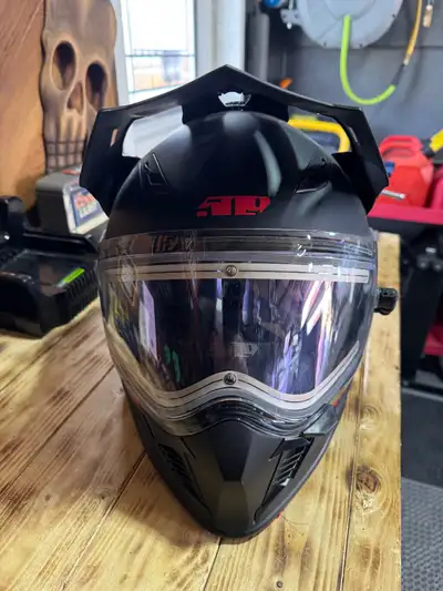 I have a 509 Polaris snowmachine/atv/side by side helmet. Black and red in colour. Never used. Heate...