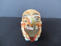 Old man's Head / Face with Bee on Nose Smoking Ashtray