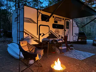 The Coleman Rubicon 1708BH is a rugged, lightweight travel trailer designed for off-road exploration...