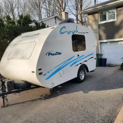 Enjoy your summer camping in this modernized fun camper! Lots of storage 950lbs empty Kelty shelter...