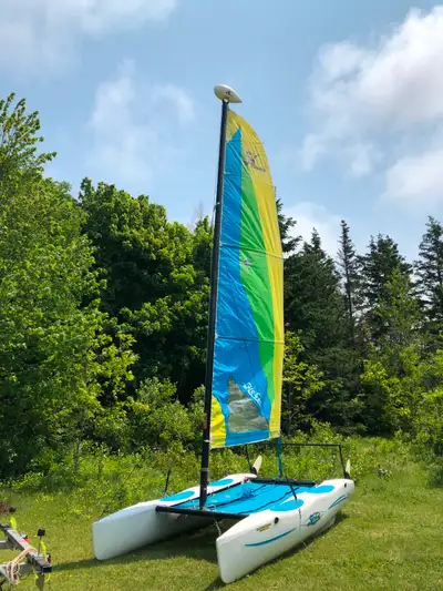 Hobie Cat Wave and Trailer. Great condition. Stored inside .