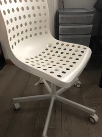 Plastic chair with holes
