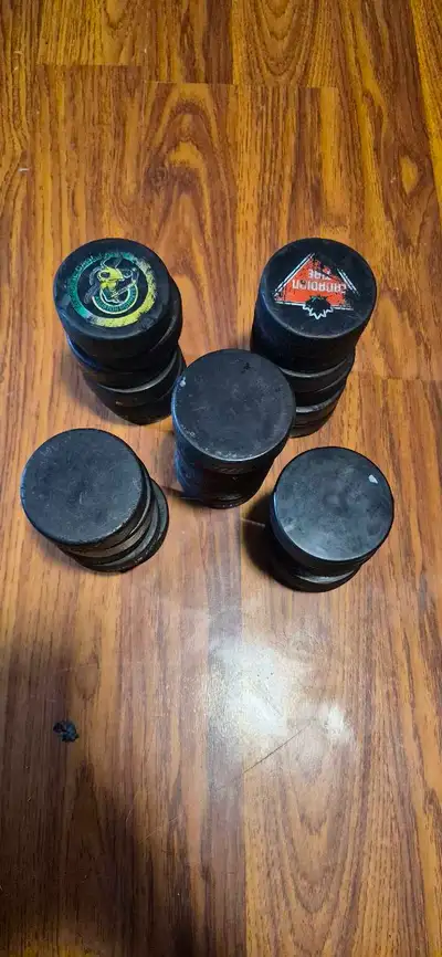 $1 each used hockey pucks, View more