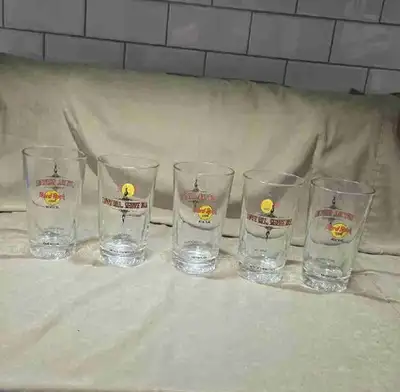 Up for sale is a premium, matching set of 5 vintage Hard Rock Cafe Montreal collector pint glasses (...