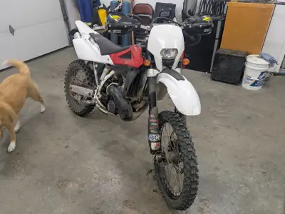Looking to trade my street legal two stroke Husqvarna 300cc bike for a regular cab Long box pickup....