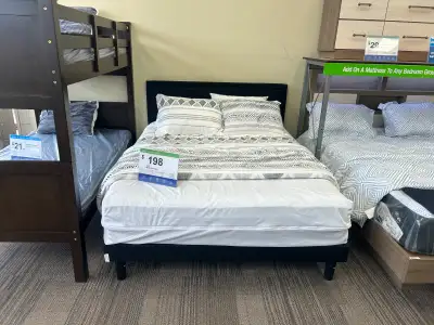 Bed frame, queen size, mattress and bedding not included. Available at easyhome 9104 118 avenue NW....