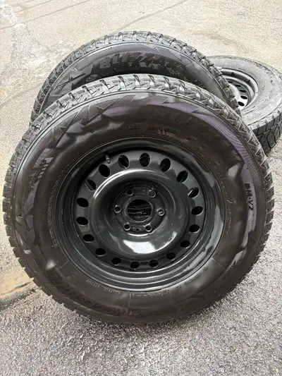 Winter wheel package Bridgestone Blizzak DM-V2 275/65R18 (9-10/32 tread) 6x139.7 mm Steel Rims TPMS...