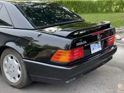 R129 mercedes 500sl for sale. Rare black on black with very rare Hella spoiler. I absolutely love th...