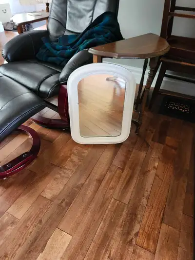 Antique mirror. 23on high x 15in wide.