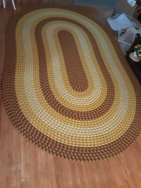 braided oval wool rug