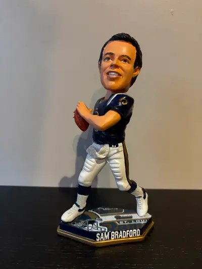 This is a Sam Bradford bobblehead during his time with the St. Louis Rams, (now LA Rams). This bobbl...
