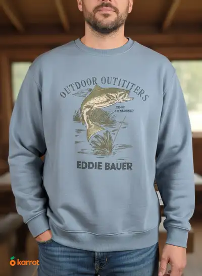 Snuggle up in style with this new Eddie Bauer sweatshirt, featuring a cool outdoor outfitter design...