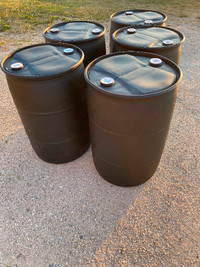Black Plastic 50 gallon barrels