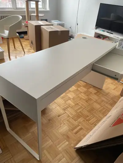 White IKEA MICKE desk for sale. The drawers work perfectly and the desk is in good condition. Dimens...