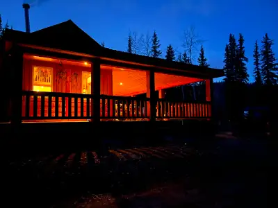 House for sale on klondike river with 5 acres running along river and new 40/40 shop with hoist and...