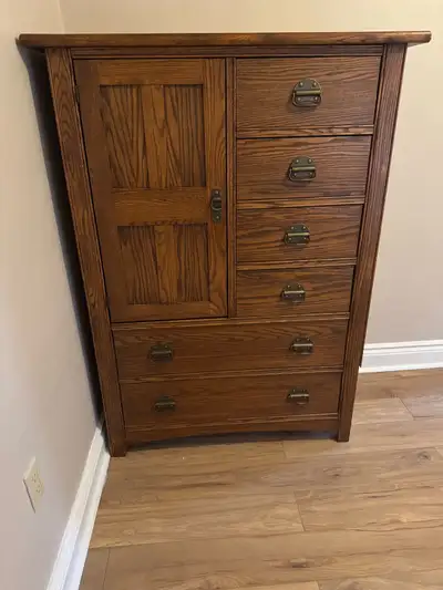 Beautiful armoire solid in mostly good condition. Canadian made. 56 1/4 in tall, 38 in long and 18in...