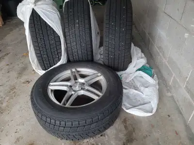 One season old winter tires with rims, very good condition, reason for selling- sold my car last yea...