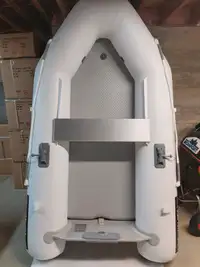 Light 7.5-foot inflatable boat. Only 31 lbs.