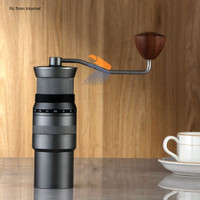 Manual coffee grinder with flat burrs