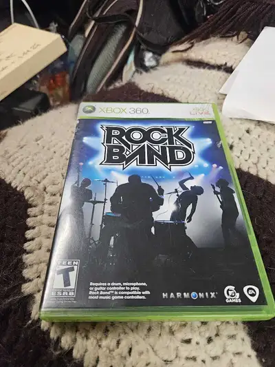 Get ready to rock with Rock Band for Xbox 360! This complete game, compatible with music game contro...