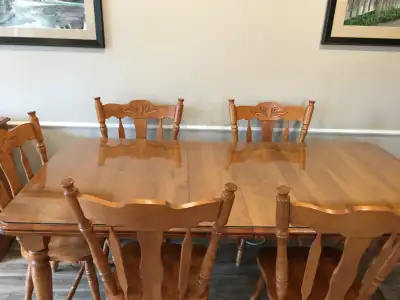 Solid hardwood dining table with glass table top and 6 chairs, View more