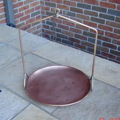 This is the solid copper tray portion of an antique Fairbanks hanging scale. The scale was made in t...