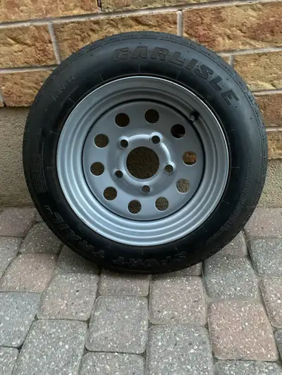 SET OF TWO TRAILER WHEELS FOR $ 60 . One rim bit bendet see on pictures but holding air good. Please...