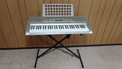 Casio LK-270 keyboard, stand and sustain pedal, View more