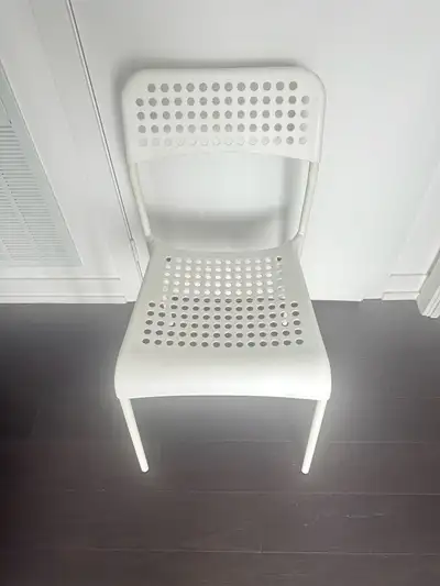This is a used Ikea chair, perfect for adding a simple, modern touch to any room. While it has been...