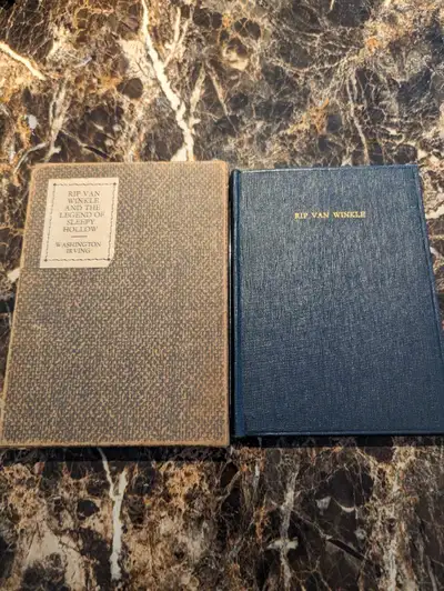 Dive into classic literature with this charming set of antique pocketbook editions of 'Rip Van Winkl...