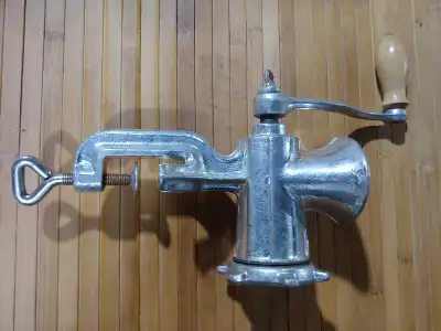 I'm offering a never used, old school meat grinder with a sturdy, clamp-on design. Perfect for the h...