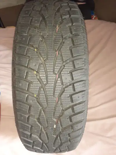 4 Winter Tires Tiger Paw 185/65R14. Were used for half a season.