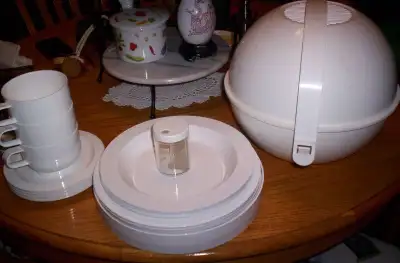 set of 4 picnic basket(cups saucers bowls and plates and salt ), View more