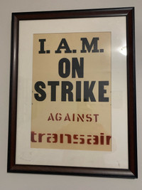 Transair on strike framed placard sign