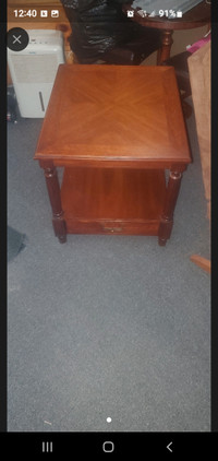 Solid Antique and Unique Wood table with bottom shelf and a bott