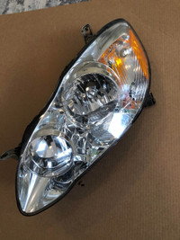 2 Toyota Corolla factory headlights right left 2003 to 2008