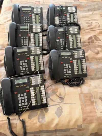 Lot of 7 Nortel/Avaya charcoal digital phones for use with BCM phone system. Used but in good workin...