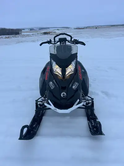 Just under 4000 km. Sled runs great haven’t had any problems. 154 3’’ lugs Brp can Cover included Ra...
