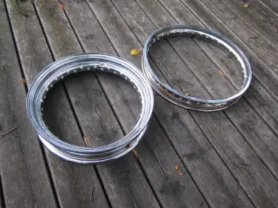 40 Spoke wheels. The rims are in very good condition. Size 3.00x16 and 1.85x19 $80 each or $120 for...