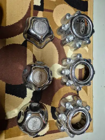 Garage cleaning. Ranger and F250 centers. The 8 bolt centers include nuts. If you need one shoot me...