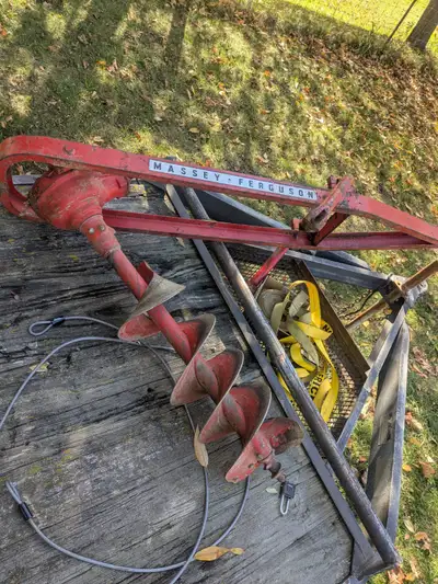 Massey Ferguson 3 point hitch post hole auger. Good working condition 12 inch auger with replaceable...