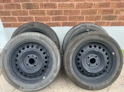 205/55R/16 All Season Elite tires on steel rims. Only driven on for 3 months before car died and scr...