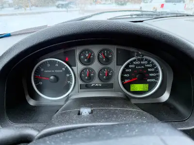 Selling pick up truck low kms meticulously maintained 4x4, all leather interior no rips dvd package...