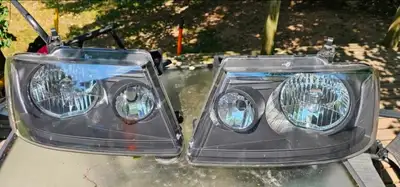 Aftermarket headlights from a F-150. Should fit years 2004-2008, i had them in a 2007. Fits factory...