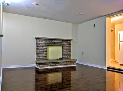 Open concept one-bedroom walkout basement apartment with living, dining, kitchen, washroom and in-un...